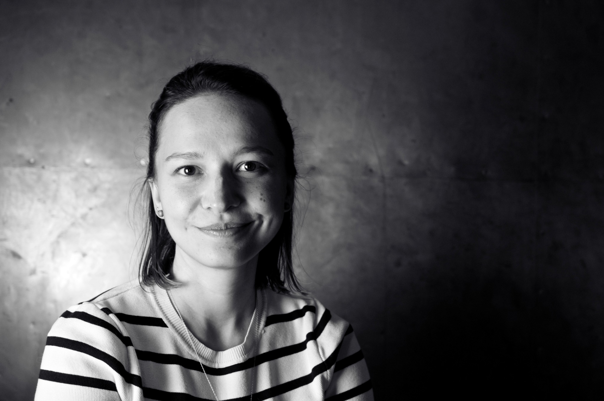 Black-and-white portrait of Olga Reed in the studio